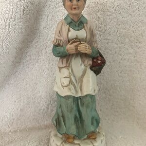 Lady Holding Basket Figurine